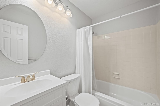 full bathroom featuring vanity, shower / bathtub combination with curtain, and toilet