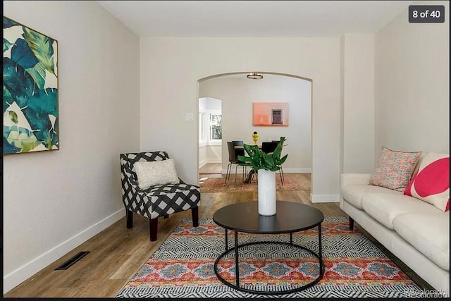 sitting room with light hardwood / wood-style floors