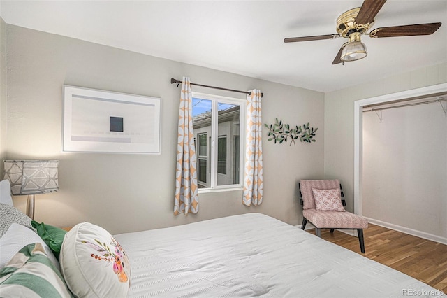 4051 S Cherokee St, Englewood, CO 80110 - bedroom featuring wood finished floors, a closet, and a ceiling fan