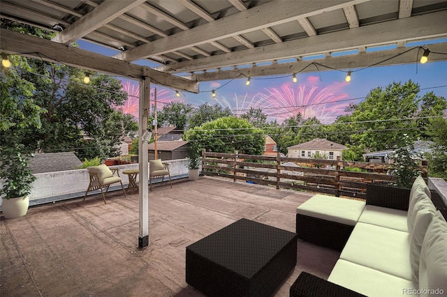 4051 S Cherokee St, Englewood, CO 80110 - patio terrace at dusk featuring an outdoor hangout area, a pergola, and a patio
