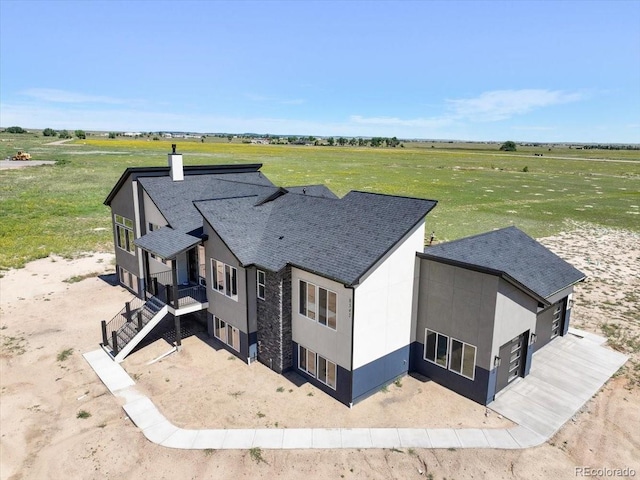 bird's eye view with a rural view