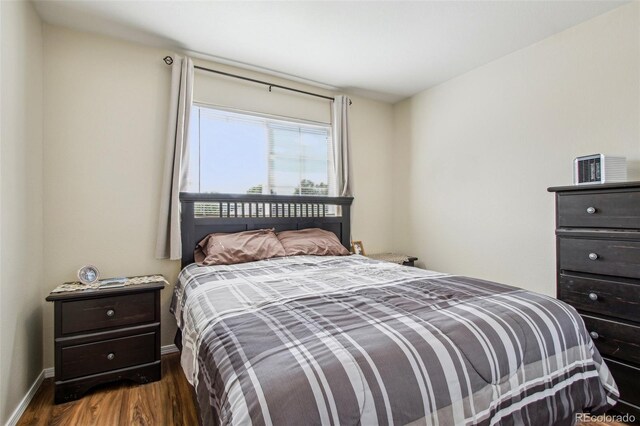 16304 10th St, Mead, CO 80542 - bedroom with wood finished floors and baseboards
