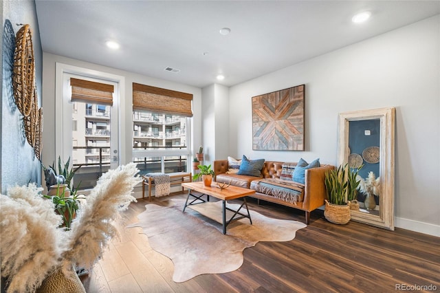 living area with dark wood-type flooring