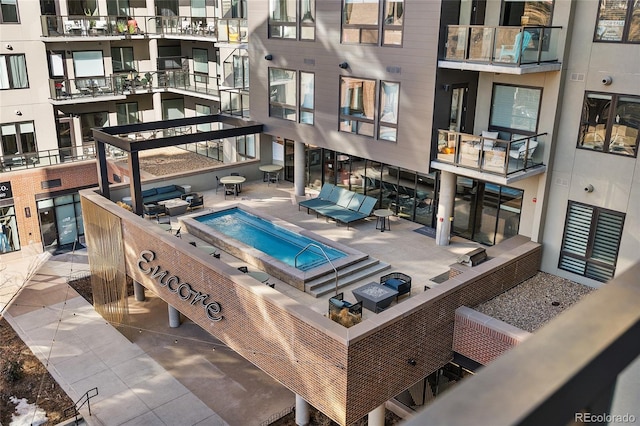 exterior space featuring a jacuzzi