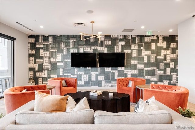 living room featuring an inviting chandelier