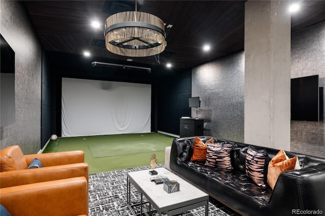 cinema room with golf simulator and wooden ceiling