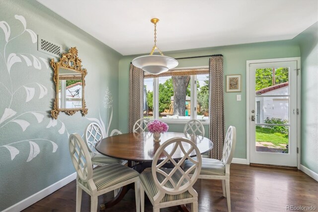 225 N Ivanhoe St, Denver, CO 80220 - dining space with baseboards and dark wood-style floors