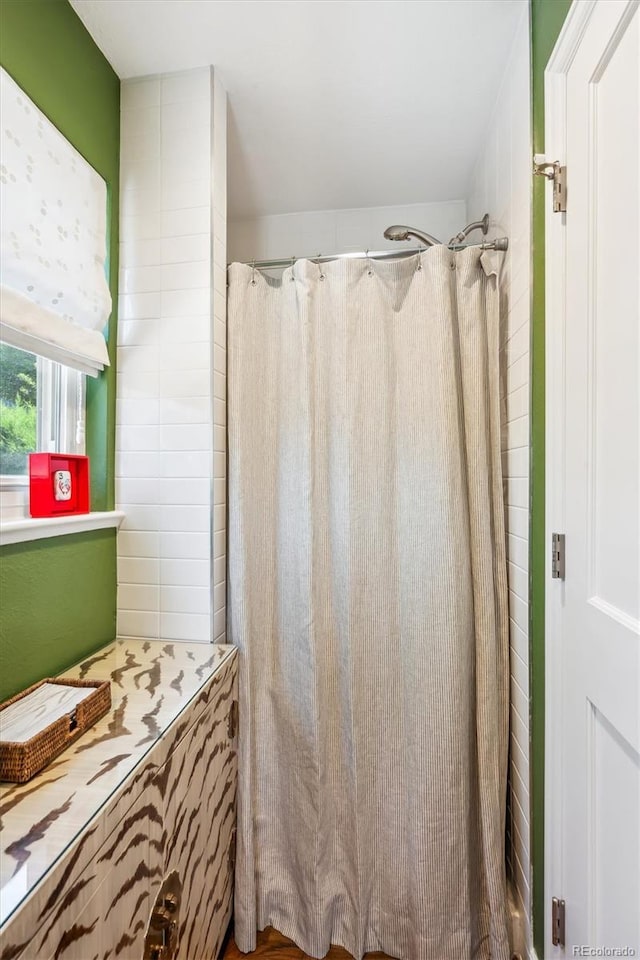 225 N Ivanhoe St, Denver, CO 80220 - bathroom featuring curtained shower