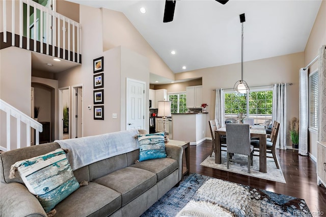 living area featuring high vaulted ceiling, recessed lighting, a ceiling fan, baseboards, and dark wood finished floors