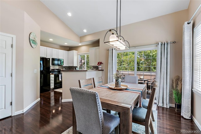 dining area with baseboards, vaulted ceiling, dark wood-style flooring, and recessed lighting