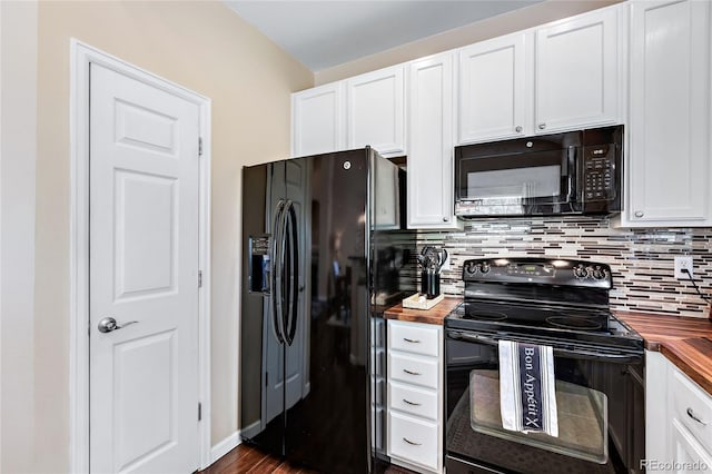 kitchen featuring white cabinets, black appliances, tasteful backsplash, and wooden counters