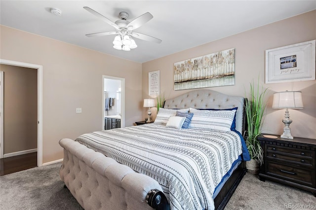 bedroom featuring a ceiling fan, carpet, ensuite bath, and baseboards