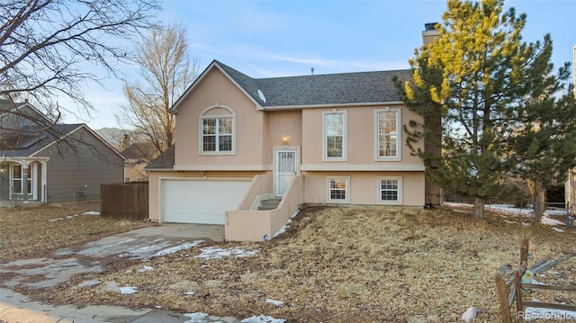 view of front of property featuring a garage