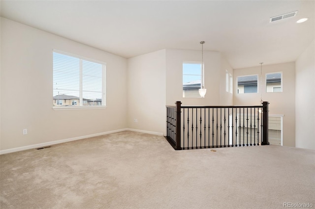 bonus room with visible vents, baseboards, and carpet floors