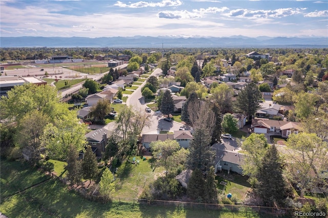 4374 E Peakview Cir, Centennial, CO 80121 - aerial view of property's location with a mountainous background and nearby suburban area