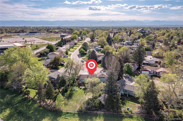 4374 E Peakview Cir, Centennial, CO 80121 - aerial overview of property's location with mountains and nearby suburban area