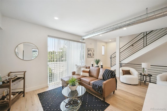 4922 Lowell Blvd Unit 3, Denver, CO 80221 - living room with wood finished floors, stairs, and recessed lighting