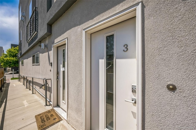 4922 Lowell Blvd Unit 3, Denver, CO 80221 - doorway to property with stucco siding