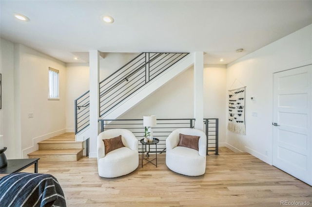 4922 Lowell Blvd Unit 3, Denver, CO 80221 - sitting room with wood finished floors, stairway, and recessed lighting