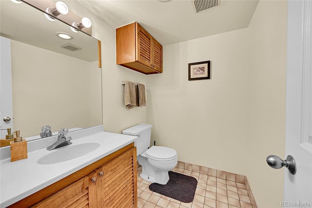 2351 Federal Blvd Unit 401, Denver, CO 80211 - half bath featuring tile patterned floors and vanity