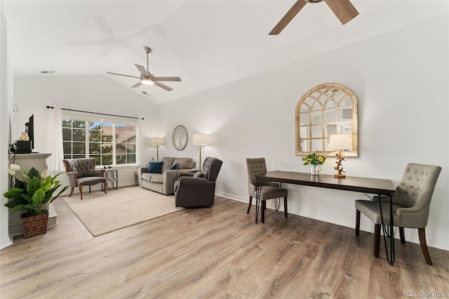 10760 Eliot Cir Unit 204, Denver, CO 80234 - living area with a ceiling fan, lofted ceiling, and wood finished floors