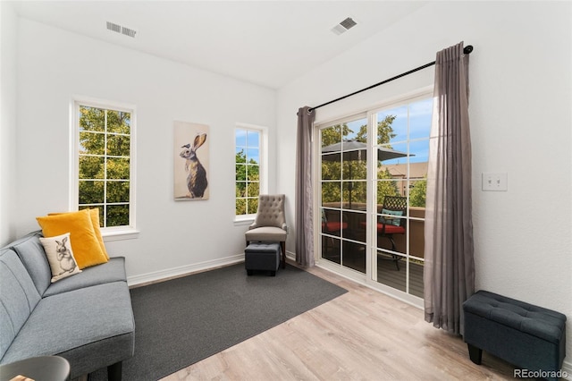 10760 Eliot Cir Unit 204, Denver, CO 80234 - sitting room with light wood-type flooring and plenty of natural light