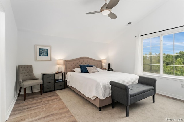 10760 Eliot Cir Unit 204, Denver, CO 80234 - bedroom featuring lofted ceiling, light wood-style floors, and ceiling fan
