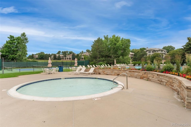 10760 Eliot Cir Unit 204, Denver, CO 80234 - community pool featuring a tennis court
