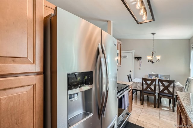 4849 S Pitkin Way, Aurora, CO 80015 - kitchen featuring appliances with stainless steel finishes, light tile patterned floors, a chandelier, pendant lighting, and light stone countertops