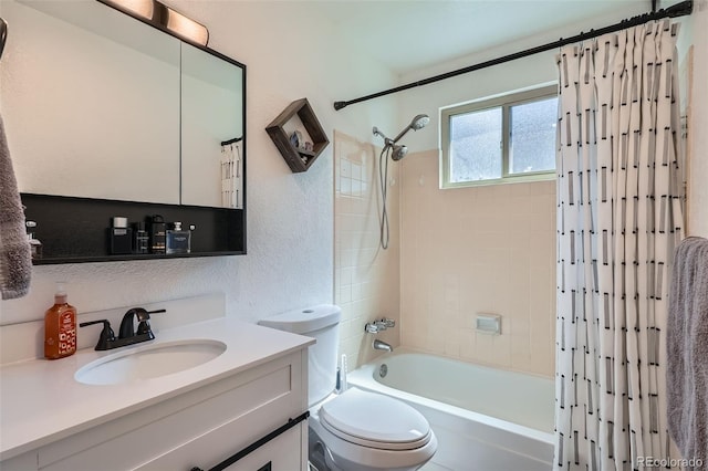 4849 S Pitkin Way, Aurora, CO 80015 - bathroom featuring shower / bath combo, vanity, and a textured wall