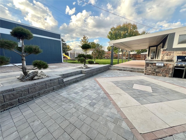 view of patio / terrace with exterior kitchen