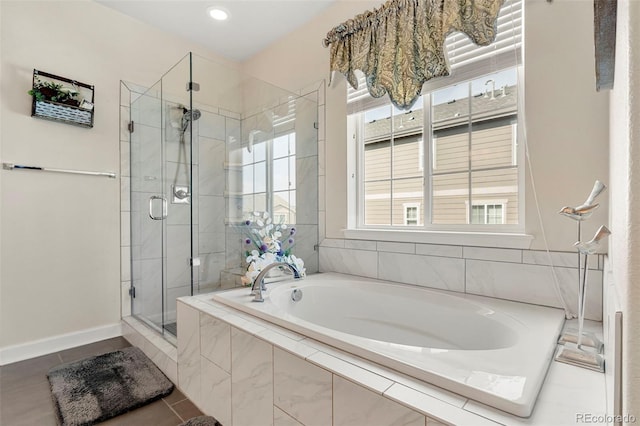 5615 Clover Ridge Cir, Castle Rock, CO 80104 - bathroom with a garden tub, a shower stall, and tile patterned flooring