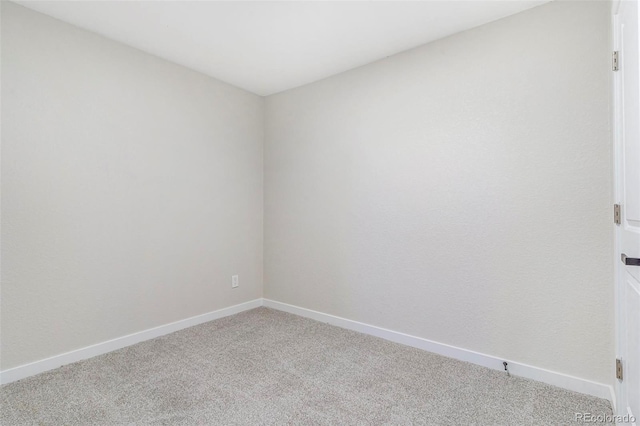 3713 S Ensenada St, Aurora, CO 80013 - carpeted empty room with baseboards