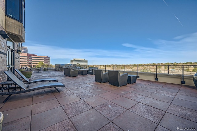 view of patio / terrace featuring a city view and outdoor lounge area