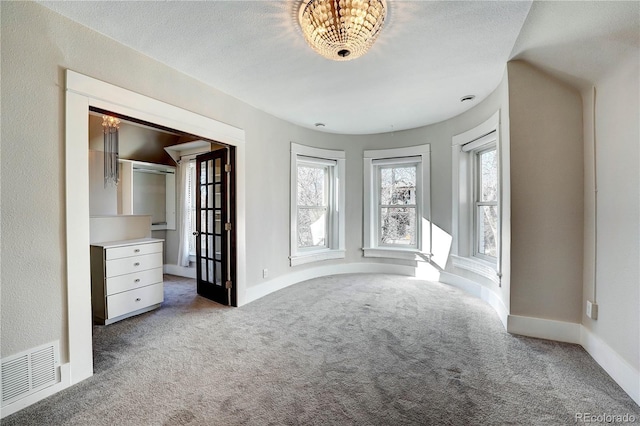 interior space with a textured ceiling