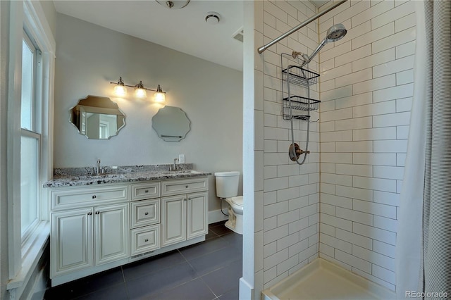 bathroom featuring tile patterned floors, vanity, toilet, and a shower with curtain