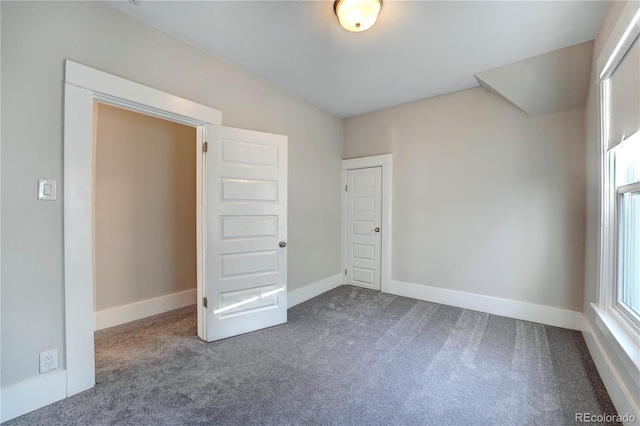 unfurnished bedroom featuring carpet flooring