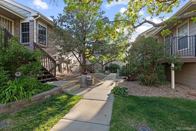 1470 S Quebec Way Unit 245, Denver, CO 80231 - view of property's community featuring stairs and a lawn
