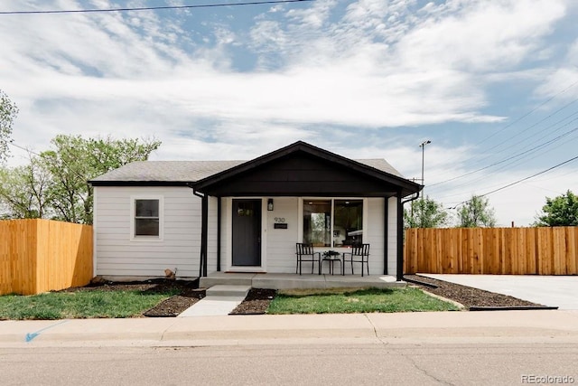 930 S Lowell Blvd, Denver, CO 80219 - view of front facade featuring a porch