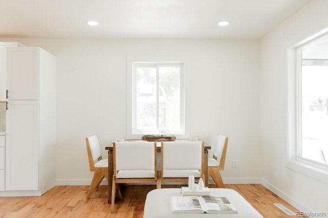 930 S Lowell Blvd, Denver, CO 80219 - dining area with light wood-style floors, recessed lighting, and baseboards
