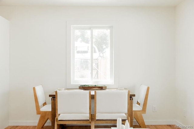 930 S Lowell Blvd, Denver, CO 80219 - dining space with wood finished floors and baseboards