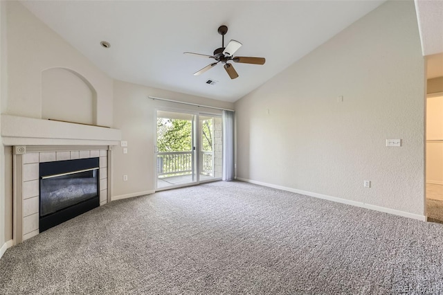 3375 Boulder Cir Unit 204, Broomfield, CO 80023 - unfurnished living room featuring vaulted ceiling, carpet flooring, ceiling fan, a tiled fireplace, and baseboards