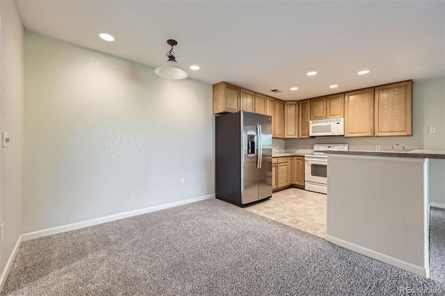 3375 Boulder Cir Unit 204, Broomfield, CO 80023 - kitchen featuring white appliances, light carpet, baseboards, recessed lighting, and hanging light fixtures