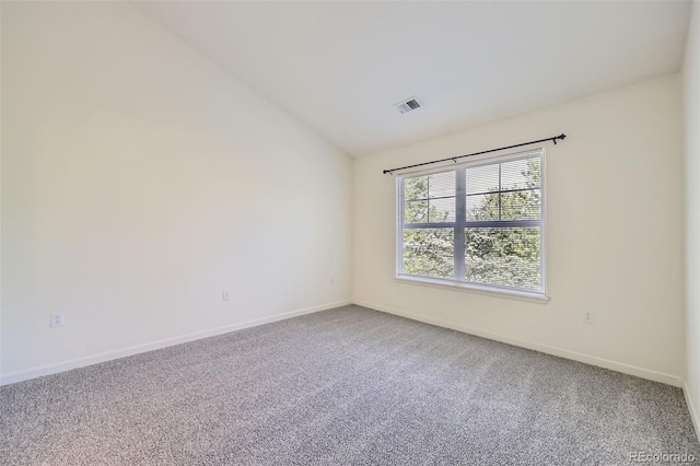 3375 Boulder Cir Unit 204, Broomfield, CO 80023 - spare room featuring lofted ceiling, carpet, and baseboards