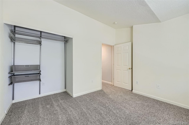 3375 Boulder Cir Unit 204, Broomfield, CO 80023 - unfurnished bedroom featuring carpet, baseboards, and a textured ceiling