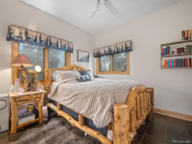 23076 Oehlmann Park Rd, Conifer, CO 80433 - bedroom featuring a ceiling fan and tile patterned floors