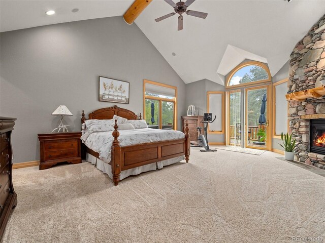23076 Oehlmann Park Rd, Conifer, CO 80433 - bedroom featuring access to exterior, carpet, a fireplace, ceiling fan, and high vaulted ceiling