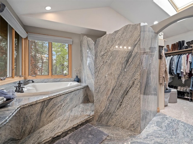 23076 Oehlmann Park Rd, Conifer, CO 80433 - bathroom with a garden tub, vaulted ceiling, recessed lighting, and a spacious closet