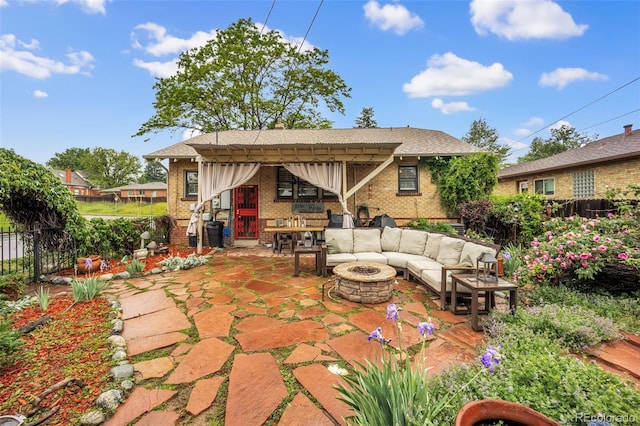3242 Utica St, Denver, CO 80212 - view of patio / terrace with an outdoor living space with a fire pit