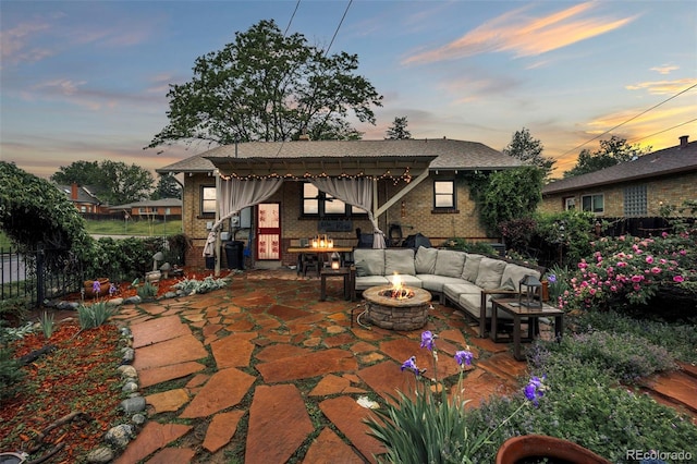 3242 Utica St, Denver, CO 80212 - view of patio / terrace with an outdoor living space with a fire pit